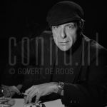 11-12-1985 Leonard Cohen in Rotterdam, The Netherlands. December 11, 1985.

[keywords]Posed, Headshot, Eye contact, Black & White image, Smoking[/keywords]